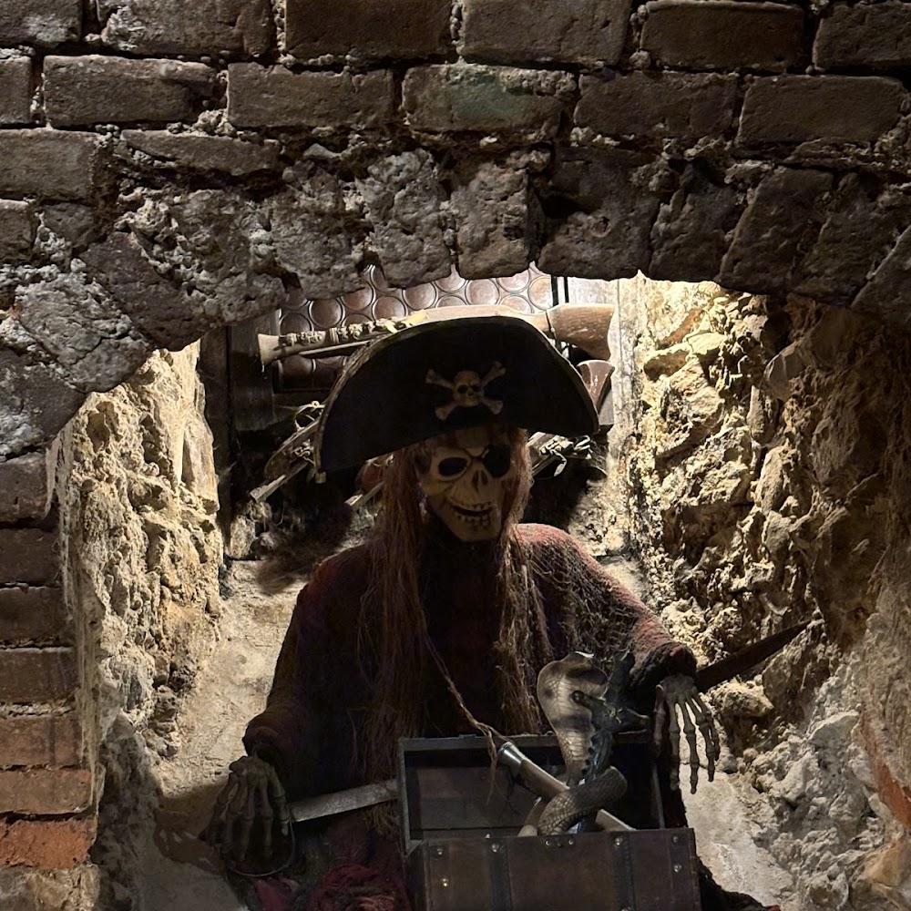 Pirate skeleton with a treasure chest.